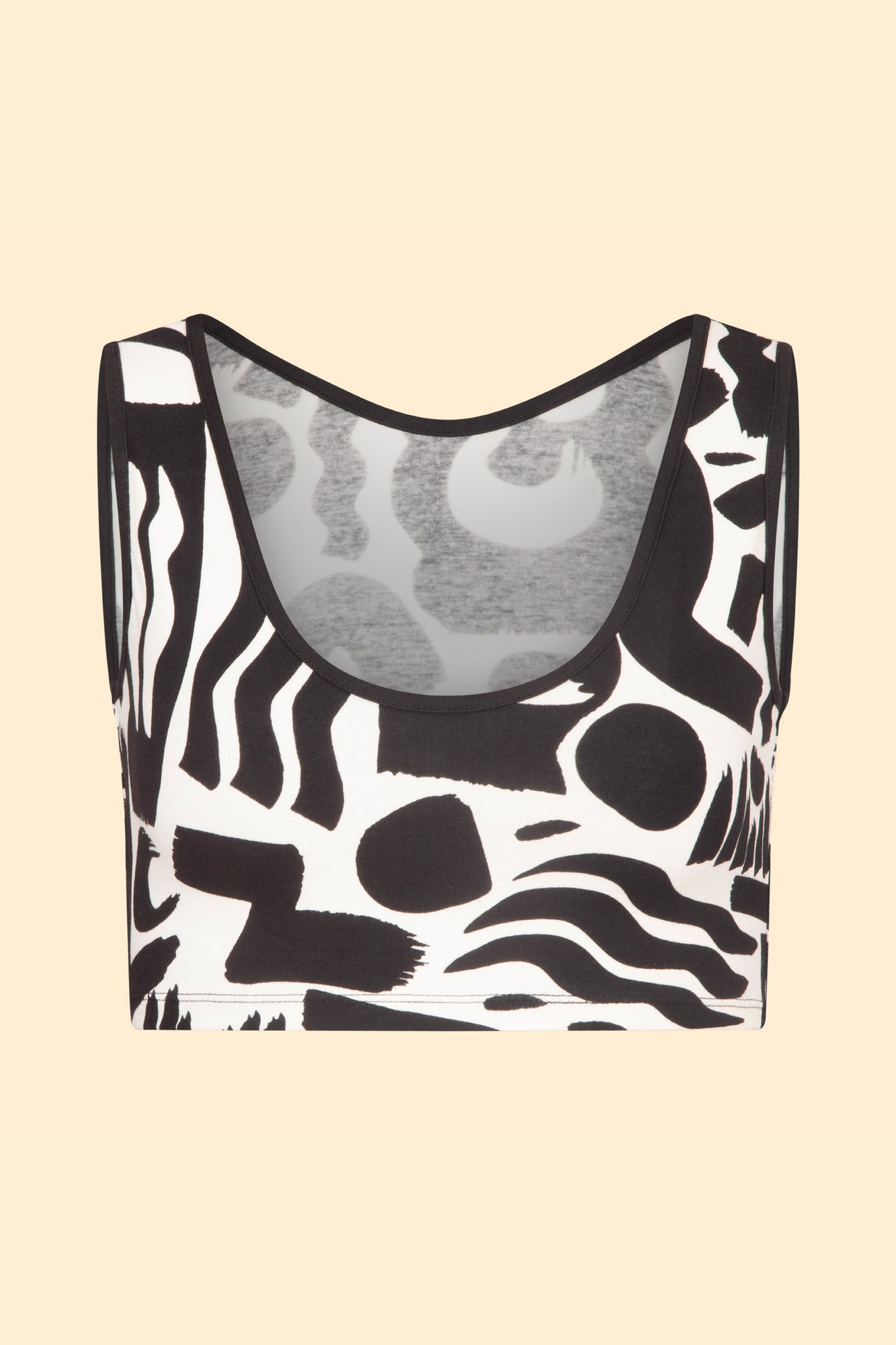 Twinks crop top in black and white with bold screen print. Includes matching shorts for a complete, stylish set.
