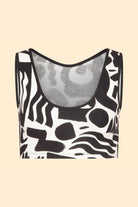 Twinks crop top in black and white with bold screen print. Includes matching shorts for a complete, stylish set.