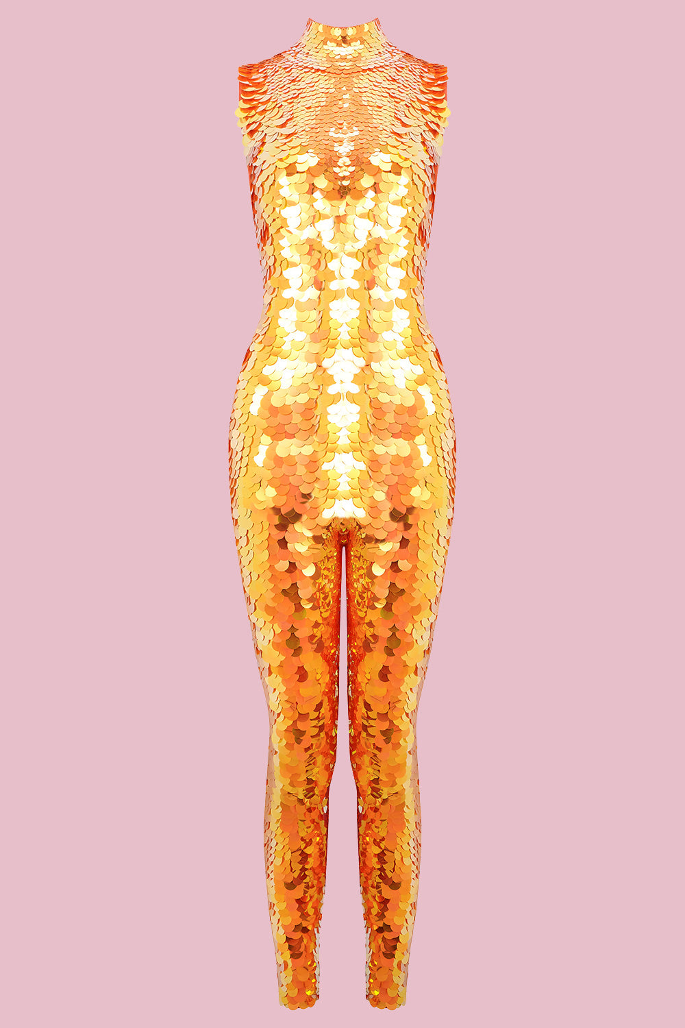 An all-in-one sequin stretchy festival jumpsuit made with large round holographic Rosa Bloom sequins. The Fox jumpsuit in front of a pink background, glistens all over in this colour way, creating a mix of shimmering sequin colours of gold and yellow that sparkles in the light.