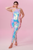 A woman with brown hair, standing facing the viewer wearing an all-in-one sequin stretchy festival jumpsuit with a high neck, made with large round holographic Rosa Bloom sequins. The woman  is wearing the Opal jumpsuit in front of a pink background. The sequins glisten all over in this Opal colour way, creating a mix of shimmering sequin colours of pinks, purples and blues that sparkles in the light.